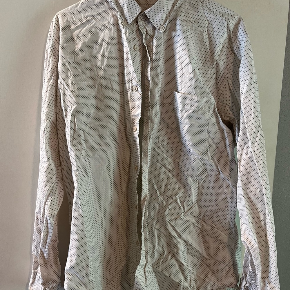 White shirt with small black dots